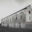 View from SW of frontage of former stationery warehouse, fronting onto Forneuk Street