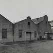 View from SW of central bays of former Plumbers' shops