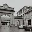 View of 'clock' entrance arch from SSW