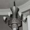 Interior. 
Detail of light fitting on staircase.