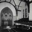 Interior. View from NW at gallery level showing apse and S transept