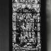 Interior. Detail of N Transept stained glass window by Alf Webster 1913