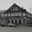 View from E of E side (left, Elliot Street) amd NE side (right, Houldsworth Street) of building