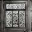 Glasgow, 56 Langside Drive, interior.
General view of ground floor reception room door to hall. Stained glass panel.