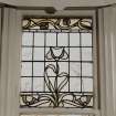 Glasgow, 52 Langside Drive, interior.
Detail of ground floor drawing room stained glass window. A design of stylized flowers.