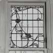 Glasgow, 52 Langside Drive, interior.
Detail of ground floor South East room stained glass window. A design of flowers.