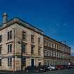 View from SW of corner of works, with Greenhead Street (left), and McPhail Street (right), including the earlier 15-bay polychrome-brick building