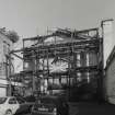 View of gate under scaffolding from S