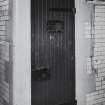 Glasgow, 19-27 Maitland Street, Police Office Building, interior.
View of specimen cell door, ground floor.
