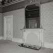 First floor, drawing room, marble fireplace surmounted by mirror, detail