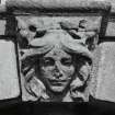 Forestair, detail of carved head above fountain