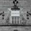 South facade, detail of central window above former entrance