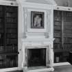 Ground floor, library, interior view of fireplace and overmantle at south end