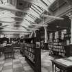 Glasgow, Kingstons Halls, Library and Police Offices, interior
General view of library from North-East showing desks, bookshelves in foreground; librarians desk in background.