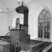 Interior view (towards ogee-canopied pulpit) from North West