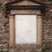 Detail of monument to Rev. James Reid set into inside of South wall.