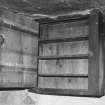 Detail of cupboard in South-West corner of farmhouse.