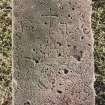 Detail of grave-slab bearing incised calvary cross.