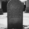 Gravestone commemorating Jane Sey d. 1895 and her husband Alexander Stuart d. 1901, 'the last of the Foundland Quarriers'.