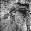 Interior.
View of mural stair showing shot hole embrasure and flagged roof of stair.