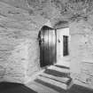 Interior.
View of doorway in NW compartment, ground floor.