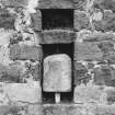 Detail of cheese press in S gable of stable