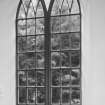 Interior. Detail of clear glazed pointed arch window