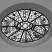 Interior. Detail of E wall oval stained glass window