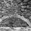 Glenbuchat Castle. Detail of relieving arch over kitchen fireplace.