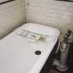 Interior.
Detail of first floor bathroom showing bath and taps.