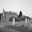 View from SE showing church and churchyard.