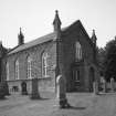 General View from NE showing church and rear entrance.