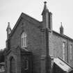 View from N showing rear entrance and boiler house.