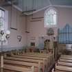 Interior.
View from SE showing pews, organ and communion table.