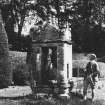 View of former bellcote of Kemnay parish kirk erected in garden of Kemnay House.