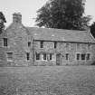 View of W wing of stable block from SW.