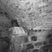 Interior.
Detail within kiln, showing base of brick-built kiln invert above rubble-built firebox.