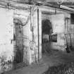 Interior.
View from NW of kiln firebox, with supply of anthracite on right.  On the wall to the right of the firebox is a home-made gauge providing an indication of the temperature of the kiln floor.