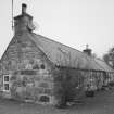Kirkton of Oyne, township: view along E side of terraced row of buildings (at NJ 6811 2566).
