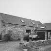 Kirkton of Oyne, township: view of two-storey covered outbuilding (at NJ 6810 2568), from SE.

