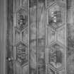 Interior.
Detail of heraldic plaques on main entrance door in library, first floor.