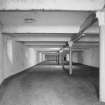 Interior view from W of Maltings Floor No.2, showing concrete vaulting supporting first floor, said to date from the conversion of the buildings from a warehouse to floor maltings