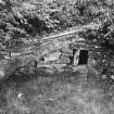 View of lean-to out-building to West of mill.