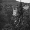 View of main tower of castle from hillside to south