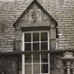 Detail of dormer with carved panel on south face of east block of castle