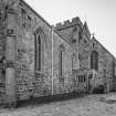 View of S side from SW showing the Lightfoot Aisle and porch