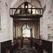 Interior. View of rood screen and chancel from E showing choir stalls