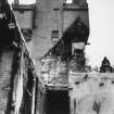 View from inside Queen Anne wing looking up towards the castle showing where the roof had adjoined. Taken during renovation work after the fire.