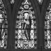 Interior. Detail of E window showing St Andrew