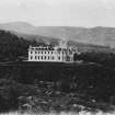 Distant view.
Insc:' Glenmuick House.         A. & R. Milne, Aberdeen.'